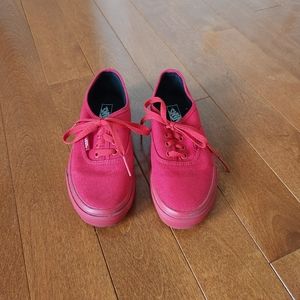 Red lace up vans with red shoestring